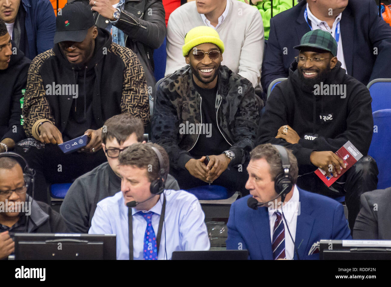 Londo , UK.  17 January 2019. Tinie Tempah (C), singer, watches an NBA basketball game, NBA London 2019, between Washington Wizards and New York Knicks at the O2 Arena.  Final score: Wizards 101 Knicks 100.  Credit: Stephen Chung / Alamy Live NewsTinie Tempah Stock Photo