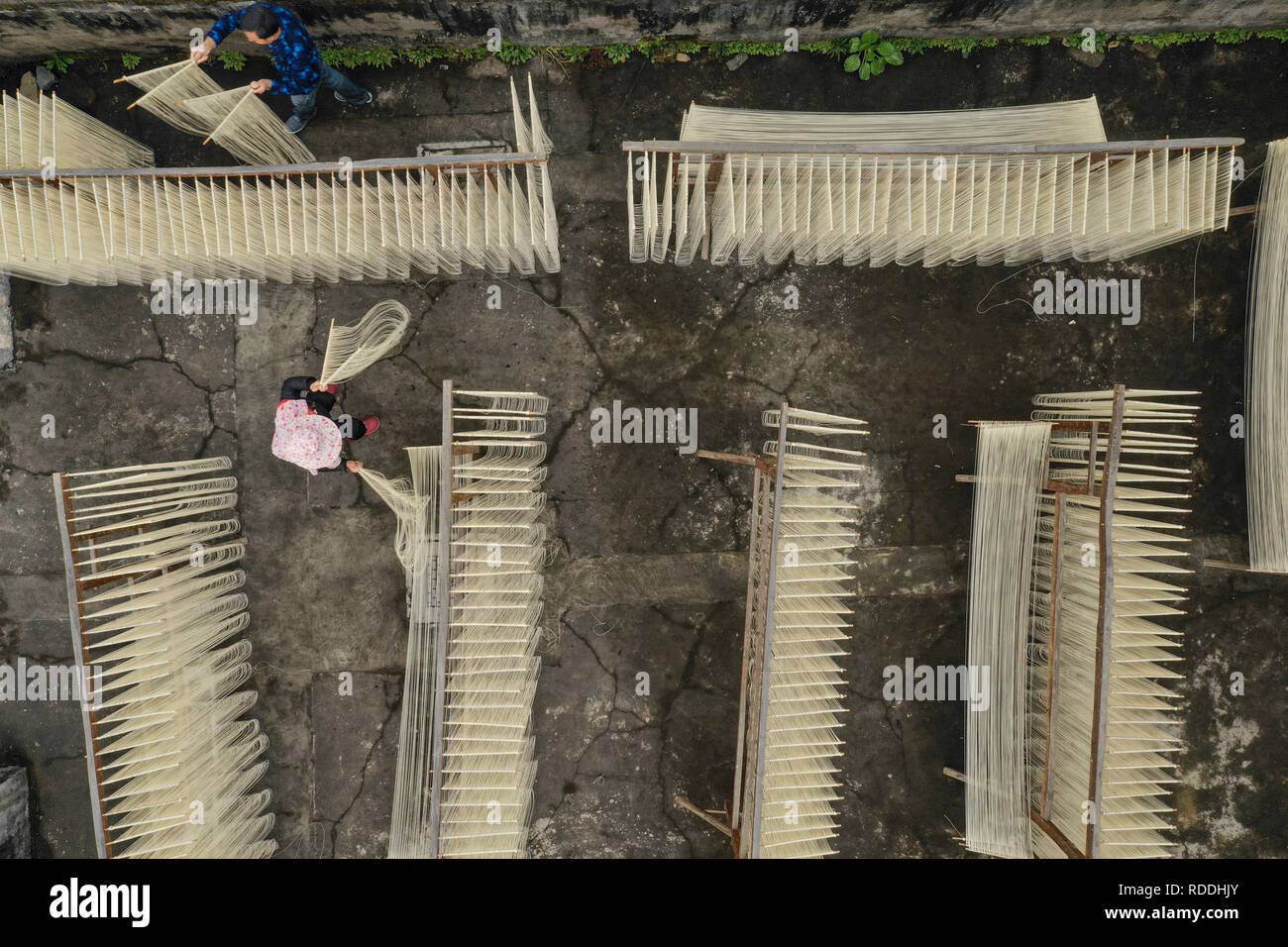 Wenzhou, China's Zhejiang Province. 17th Jan, 2019. Villagers dry noodles in Dong'ao Village of Caocun Town in Rui'an City, east China's Zhejiang Province, Jan. 17, 2019. Credit: Su Qiaojiang/Xinhua/Alamy Live News Stock Photo