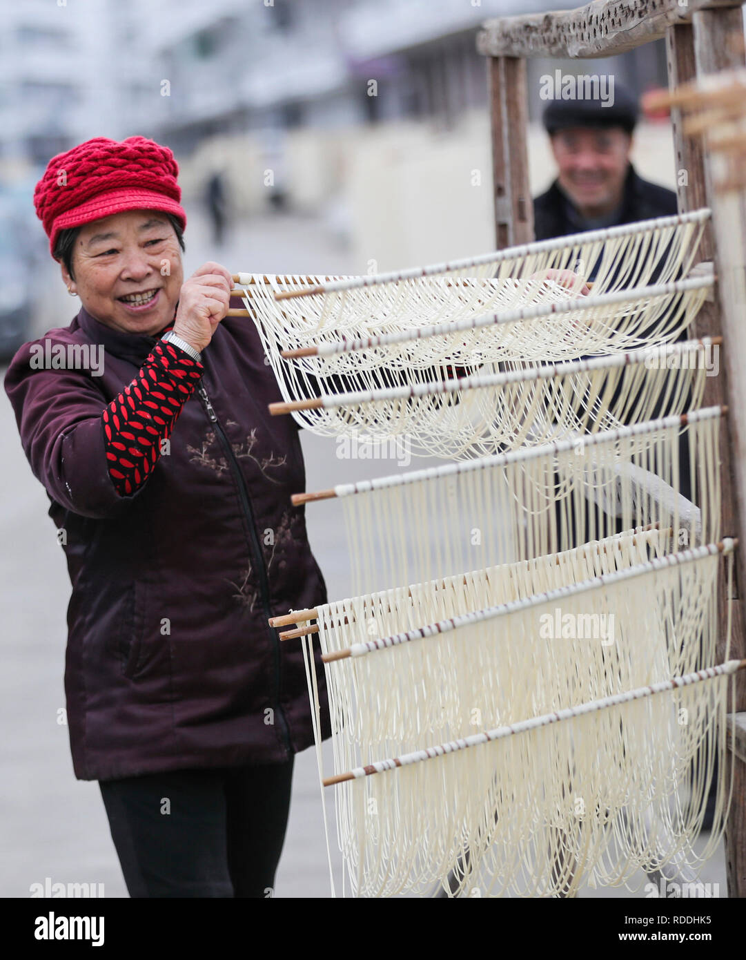Wenzhou, China's Zhejiang Province. 17th Jan, 2019. A villager dries noodles in Dong'ao Village of Caocun Town in Rui'an City, east China's Zhejiang Province, Jan. 17, 2019. Credit: Su Qiaojiang/Xinhua/Alamy Live News Stock Photo