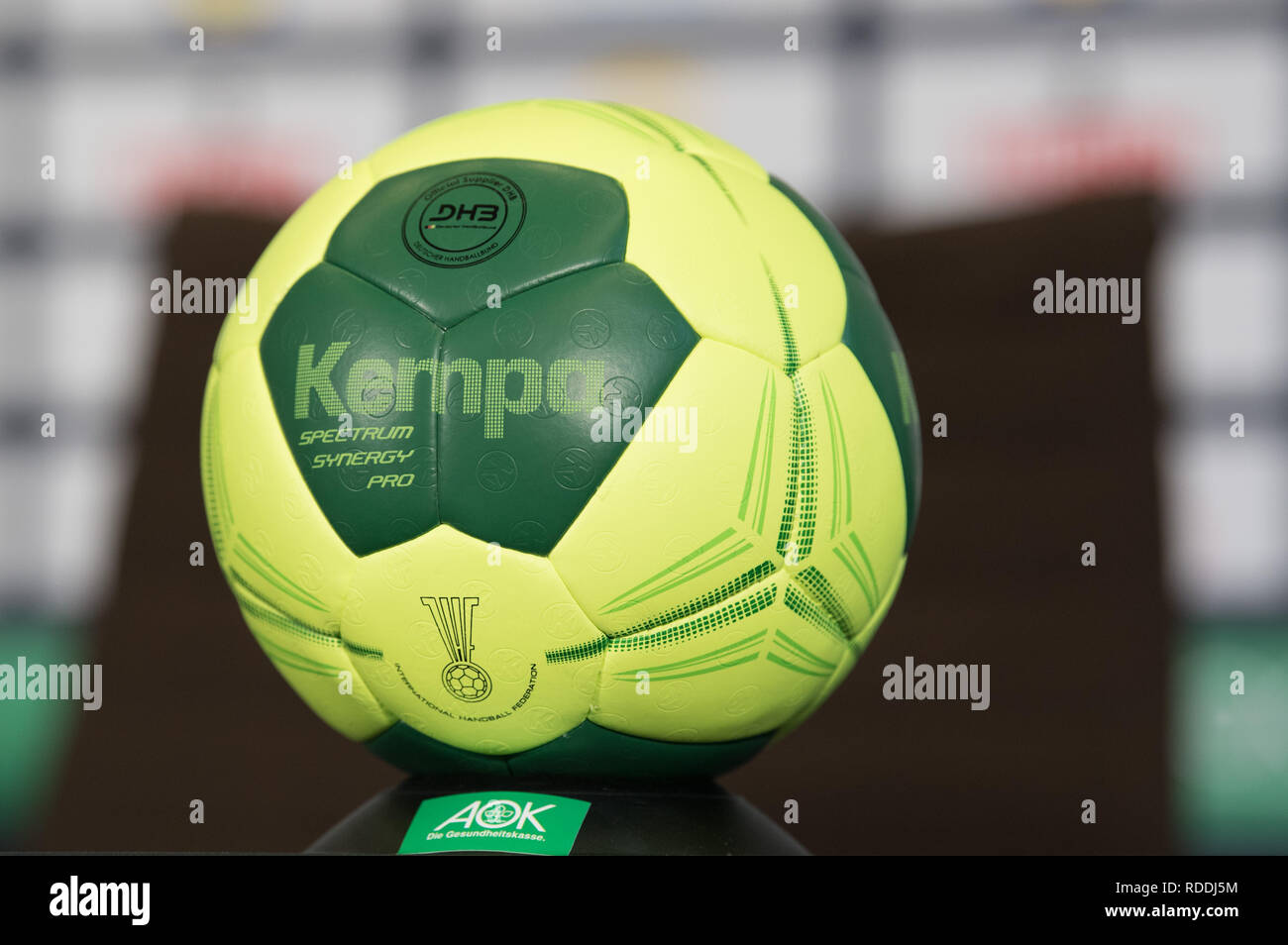 Berlin, Germany. 18th Jan, 2019. A handball with the imprint "DHB Kempa  Spectrum Synergy Pro" is on an AOK stand during a press conference after  Germany's World Cup victory against Serbia. Credit: