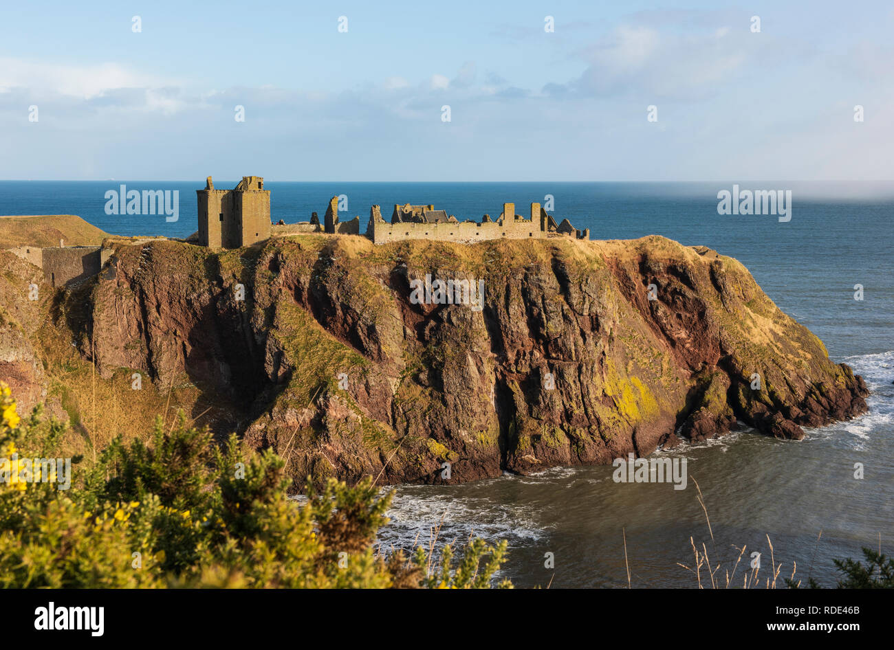 Dunnottar Castle a ruined medieval fortress located upon a rocky headland south of the town of Stonehaven, Aberdeenshire,  Scotland. Stock Photo