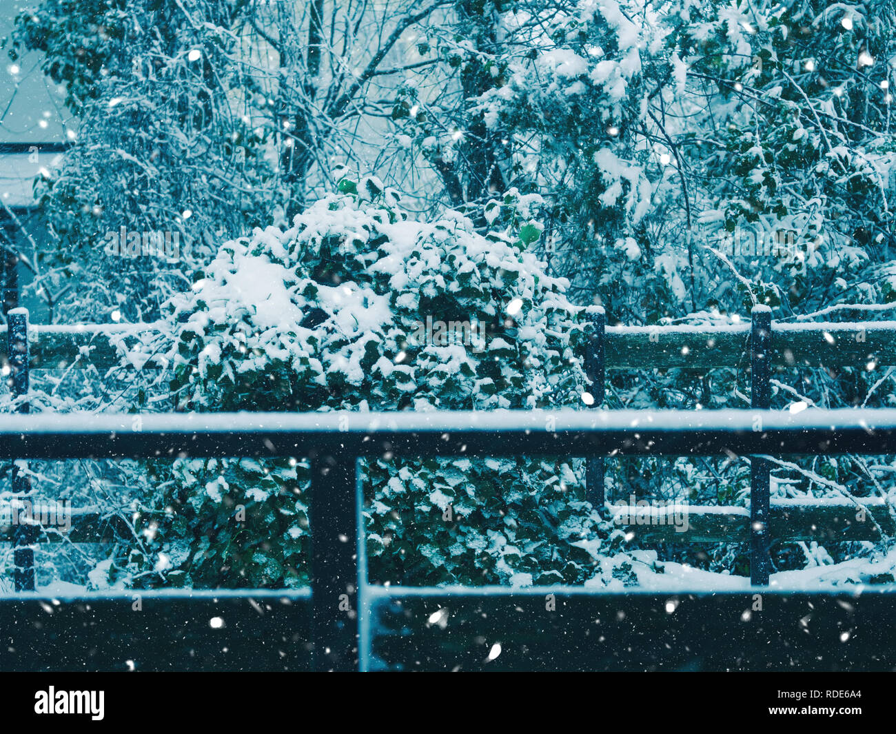 Snow fall outdoors in the countryside. House railing Stock Photo - Alamy