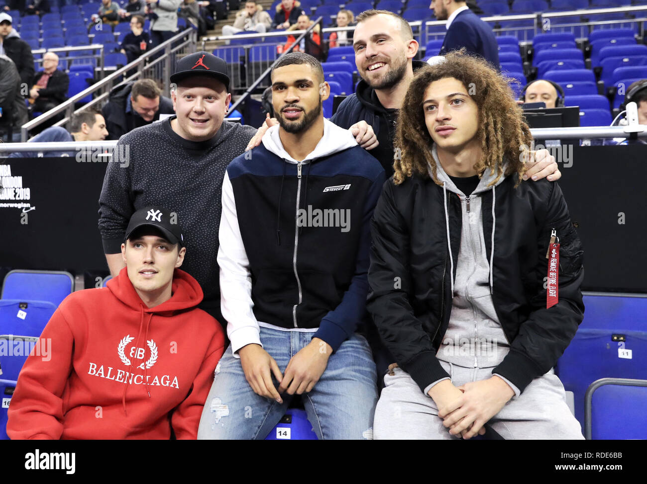Ruben Loftus-Cheek (centre), Ethan Ampadu (right) and Andreas Christensen (bottom left) pose for a picture with fans during the NBA London Game 2019 at the O2 Arena, London. Stock Photo