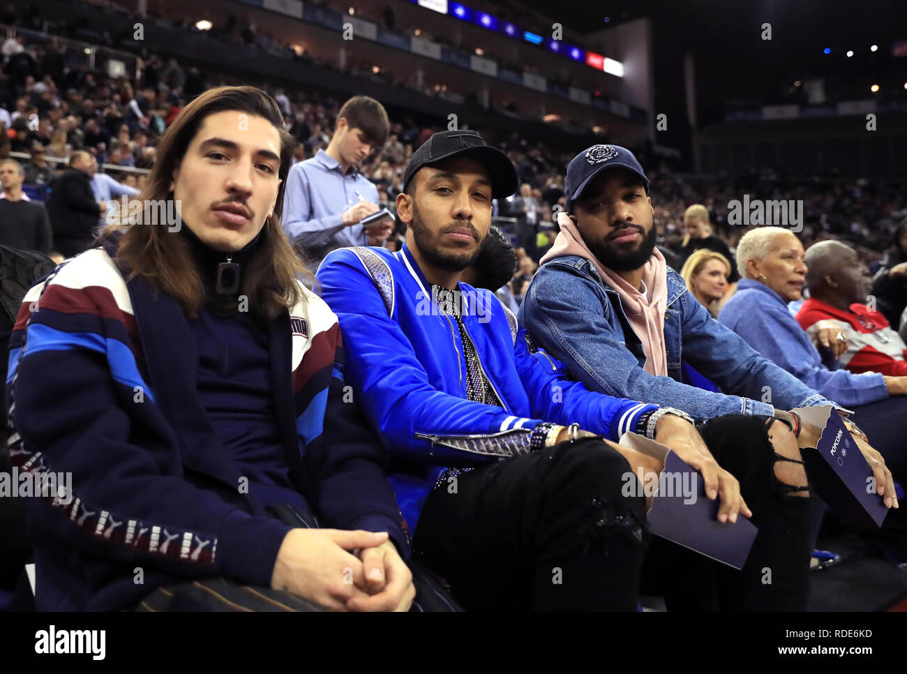 (From left to right) Hector Bellerin, Pierre-Emerick Aubameyang and Alexandre Lacazette in the crowd during the NBA London Game 2019 at the O2 Arena, London. Stock Photo