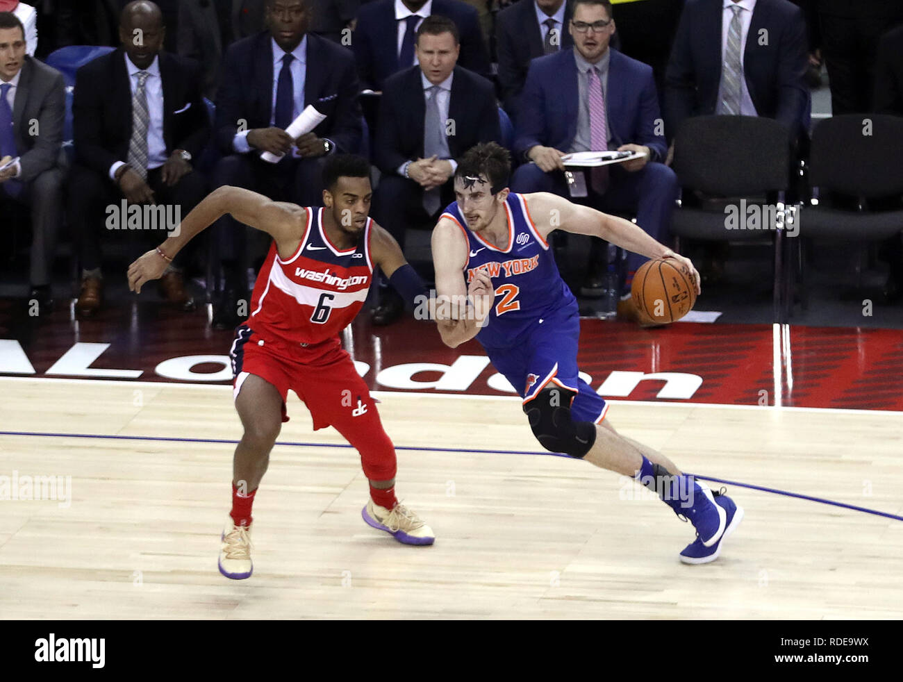 Washington Wizards' Troy Brown Jr (left) and Washington Wizards' John Wall battle for the ball during the NBA London Game 2019 at the O2 Arena, London. Stock Photo