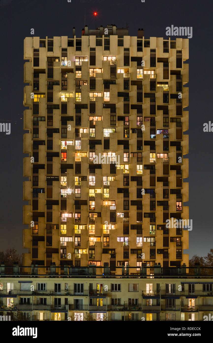Grenoble, France, January 2019 : One of the three towers at night, ile verte neighbourhood. Stock Photo