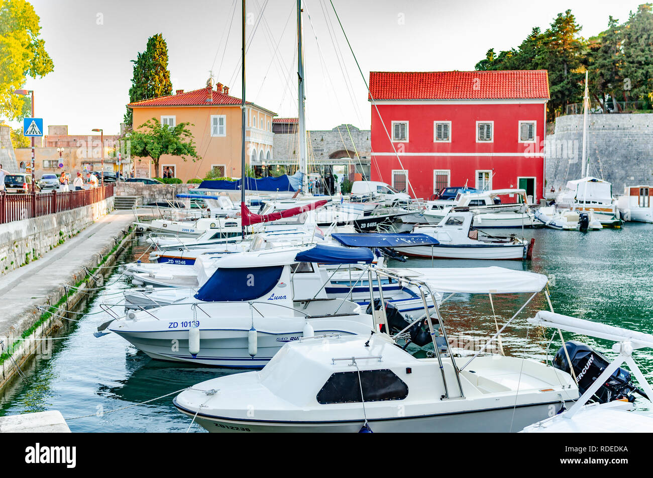 Pleasure boats and fishing boats on the pier in Fosa Bay in the spa