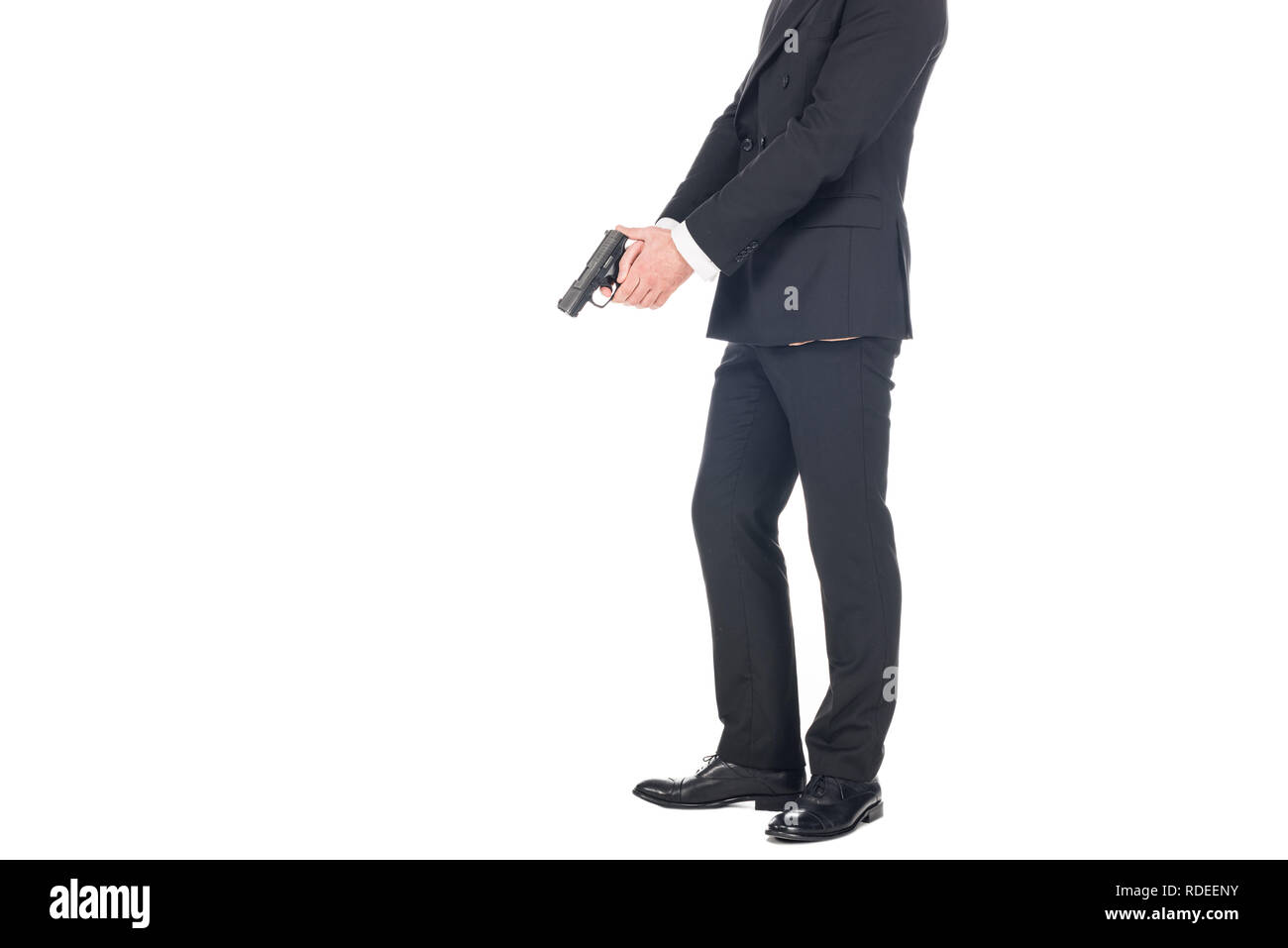 cropped view of killer in black suit holding gun, isolated on white ...