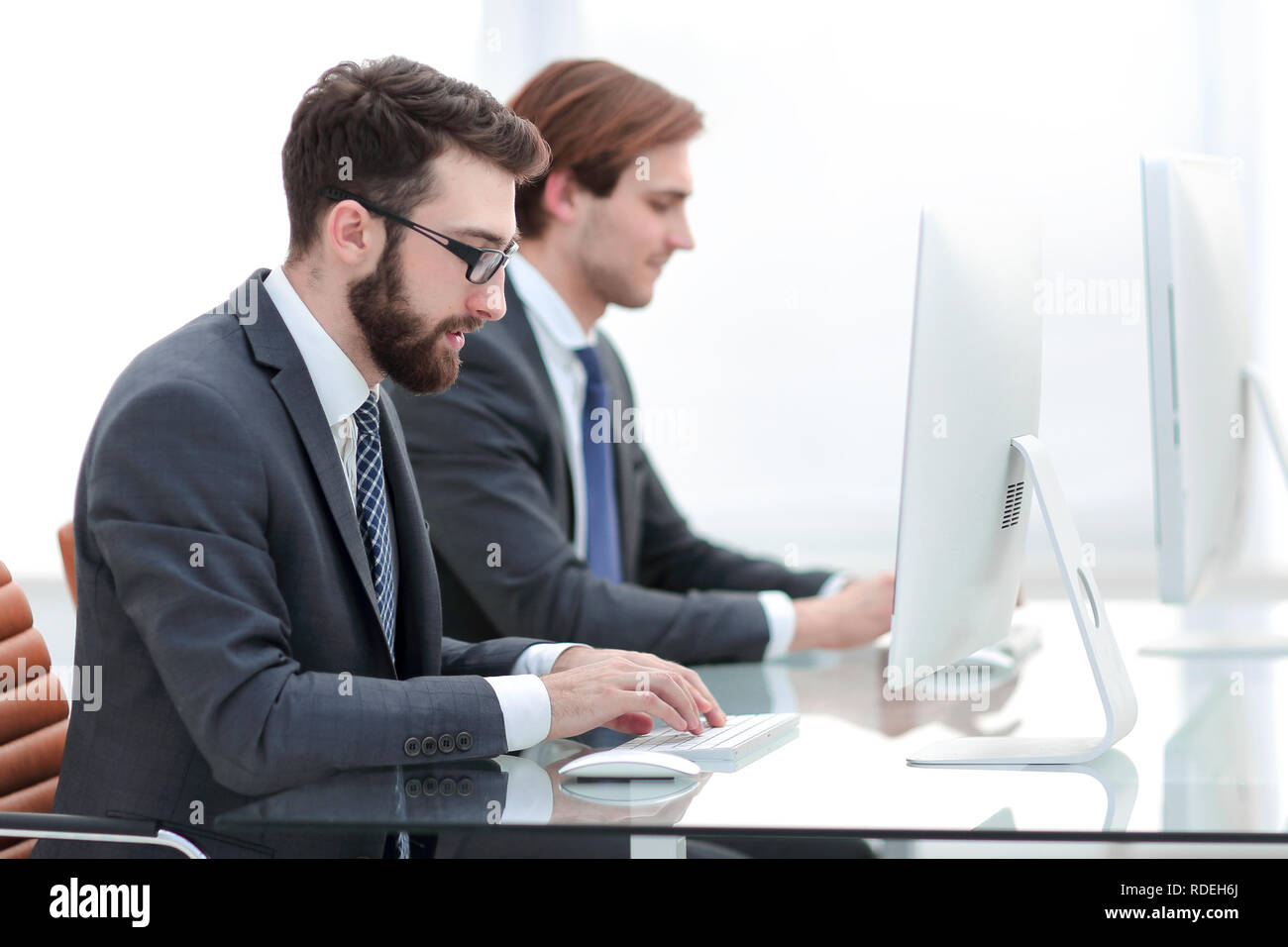 Company employees working in software development Stock Photo - Alamy