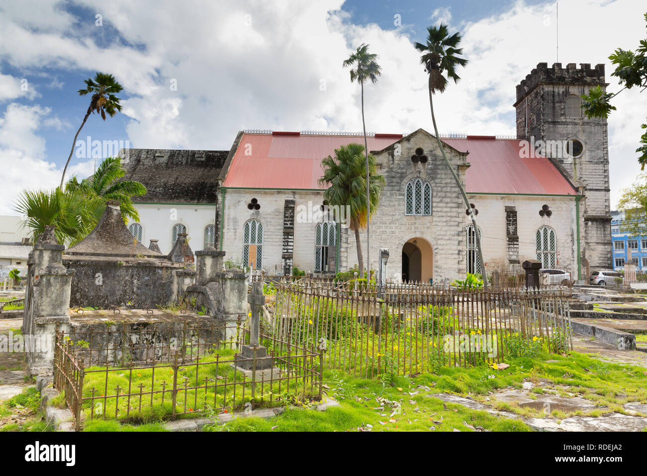 Saint Michael Anglican Cathedral from its north-facing 17th century graveyard containing the tombs of prime ministers and colonial governors Stock Photo
