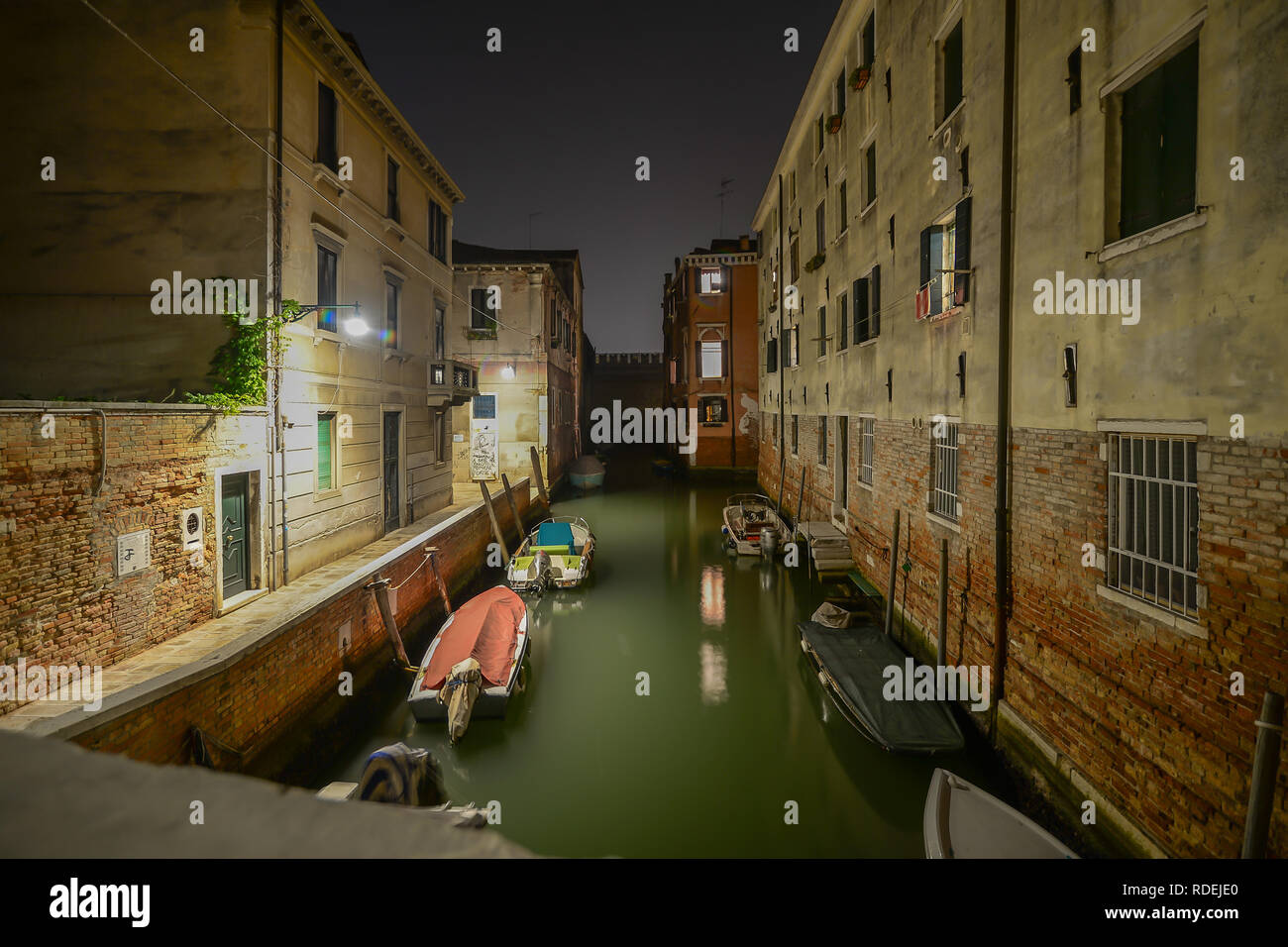 Canal in Venice at night Stock Photo