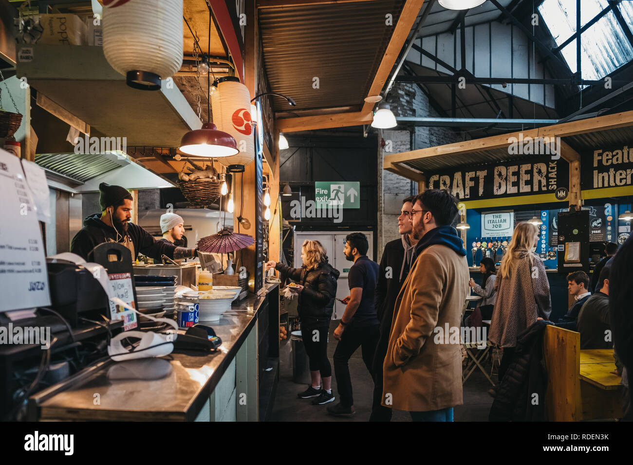 London, UK - January 13, 2019: People at Hermanos Taco House stand in Mercato Metropolitano, sustainable community market in London focused on revital Stock Photo