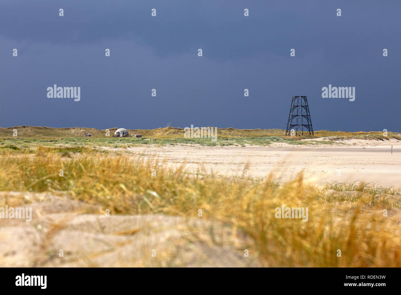The Netherlands, Rottumeroog or Rottum Island (uninhabited), belonging to Wadden Sea Islands. The navigational beacon Emder Kaap and house of ranger. Stock Photo