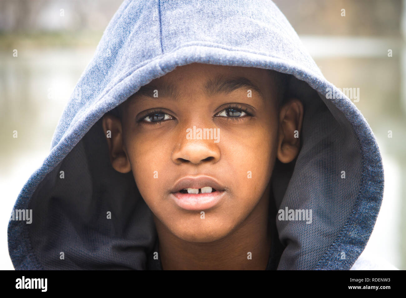 Close up of African American boy outside Stock Photo
