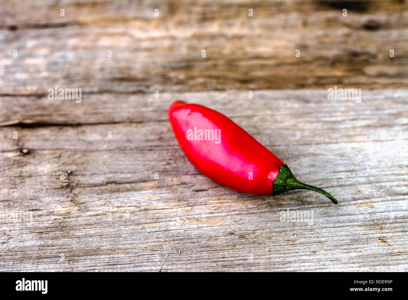 Red hot chili pepper or spicy chilli cayenne pepper, spice from mexican cuisine Stock Photo
