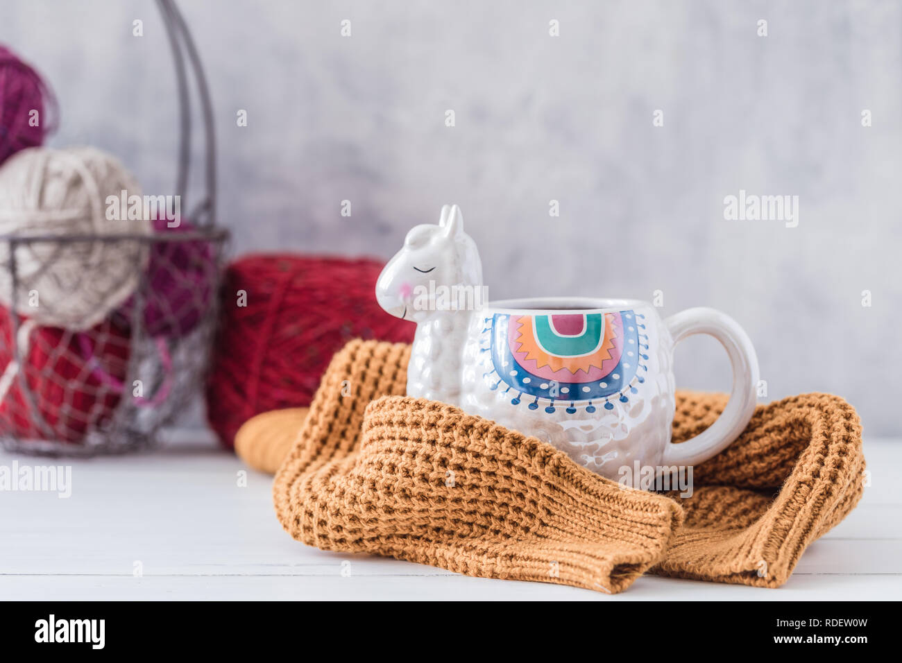 Colorful Llama Shaped Mug With Knitted Pullover On The White Wooden Table Toned Stock Photo Alamy