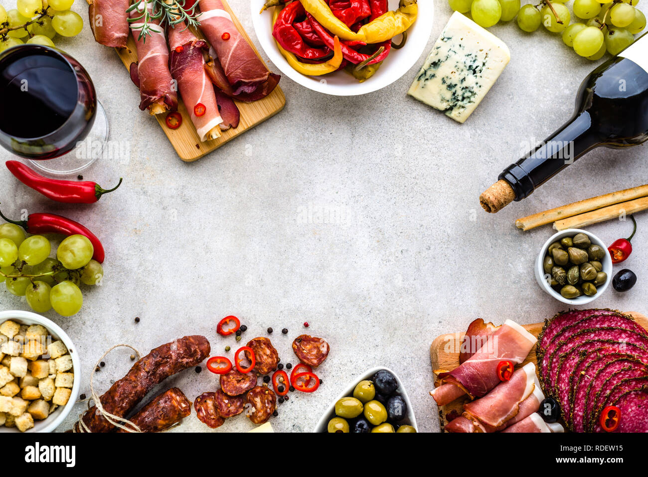 Traditional spanish tapas in restaurant, food border with variety cold  dishes Stock Photo - Alamy