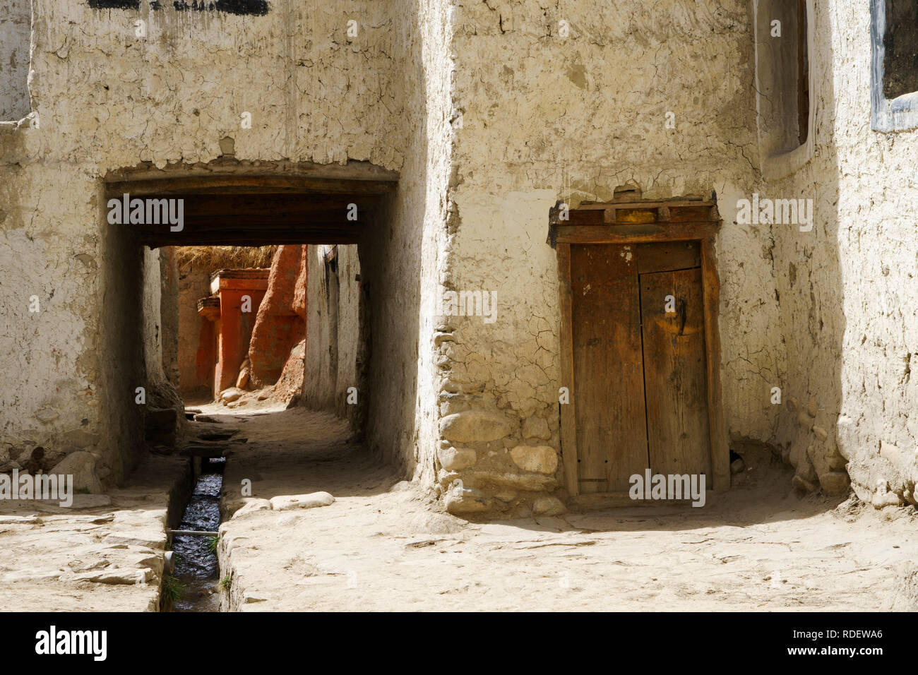 Ancient Tibetan house and passage in the fortified city of Lo Manthang, Upper Mustang region, Nepal. Stock Photo
