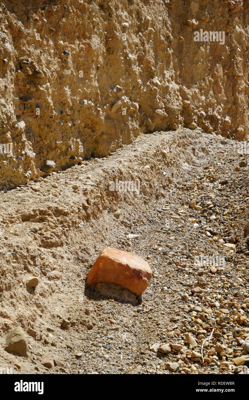 Stone fallen from a cliff on hiking trail, Upper Mustang region, Nepal. Stock Photo