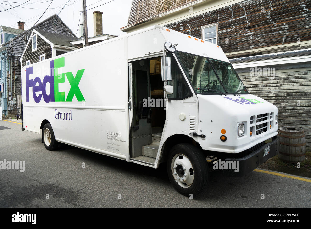 Fedex delivery truck parked on a street of Kennebunkport, Maine, USA. Stock Photo