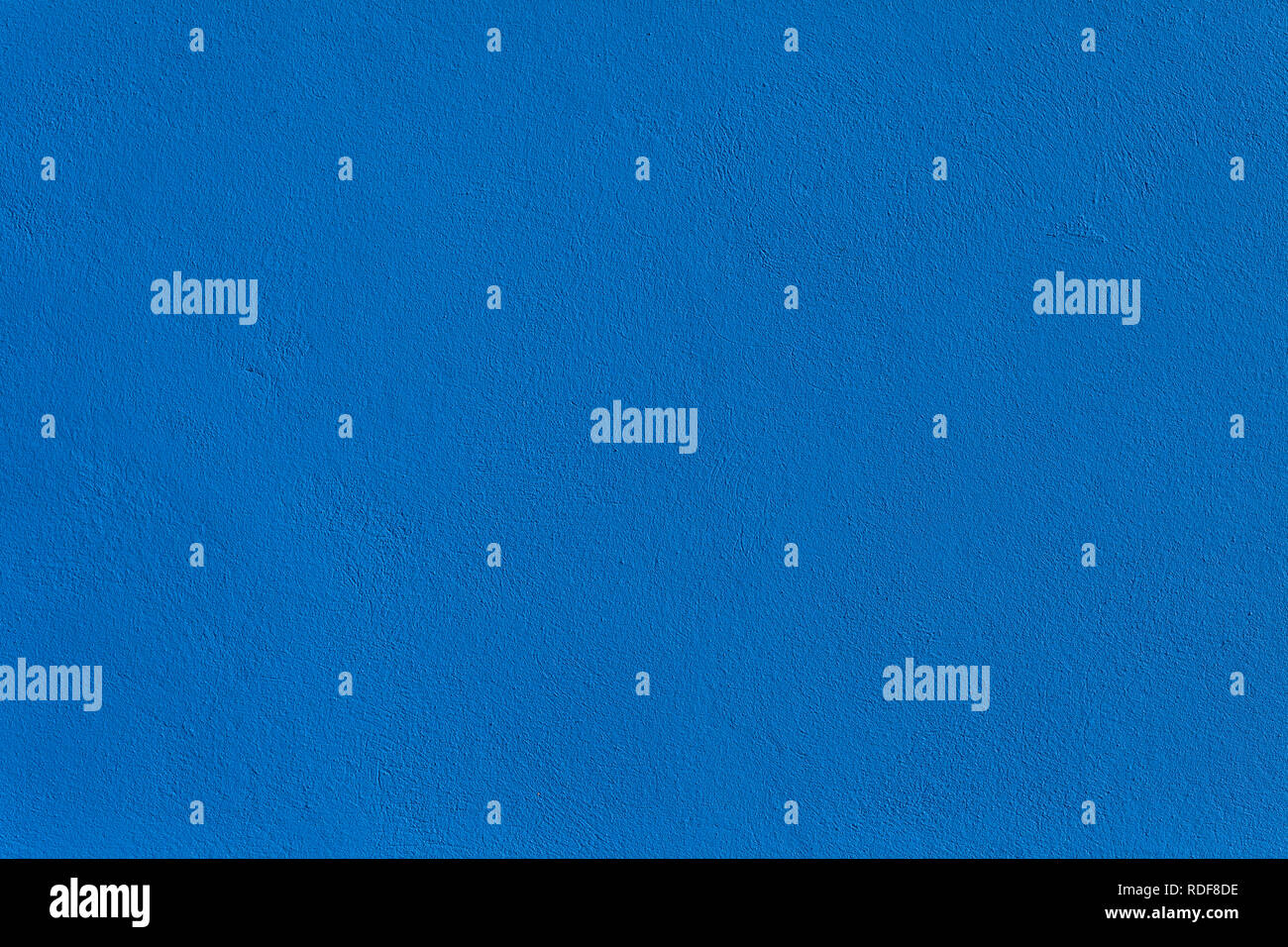 Background or texture of a cement wall painted blue. Stock Photo