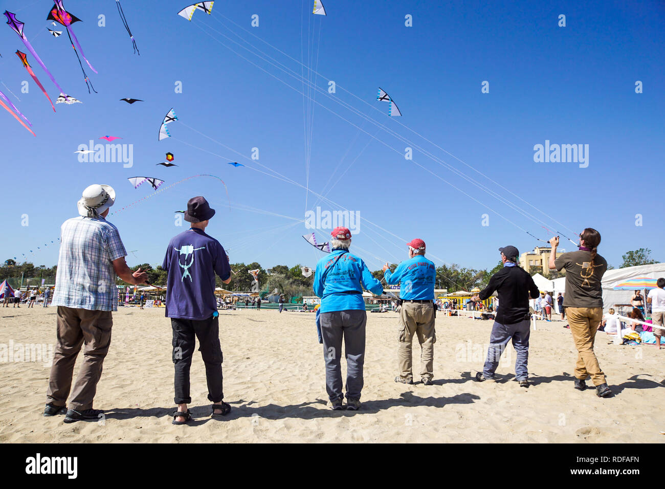 CERVIA, ITALY, APRIL 2018: Many colorful kites in different shapes at Cervia international kite festival Artevento 2018, located on pinarella beach. Stock Photo