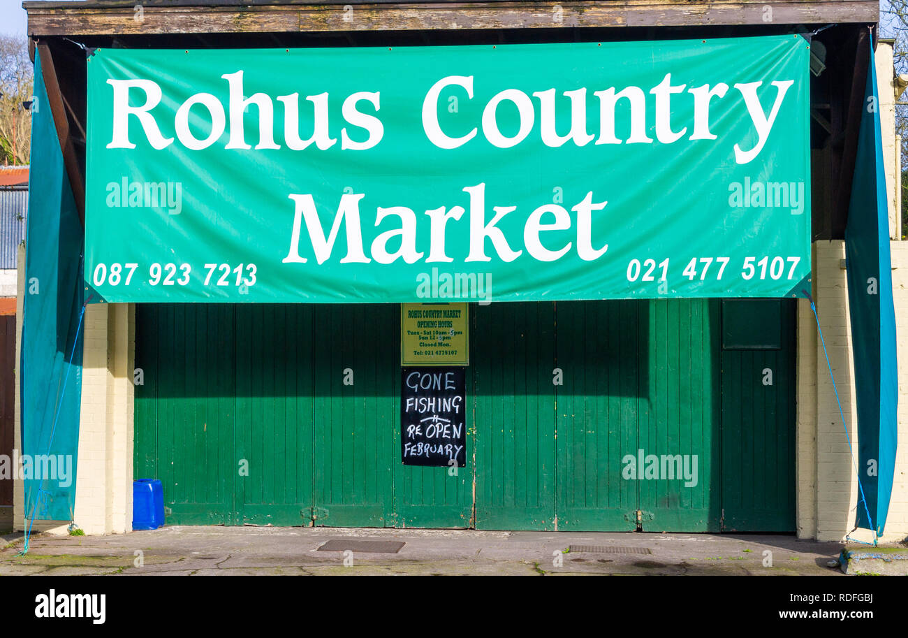 Gone fishing sign on a shut shop door Stock Photo