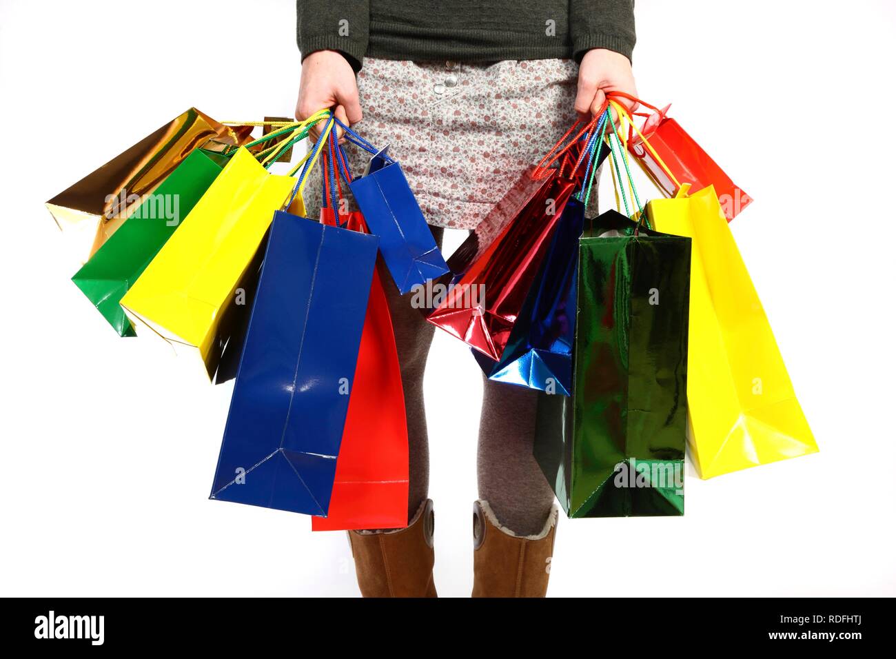 Woman carrying bags full of gifts Stock Photo Alamy