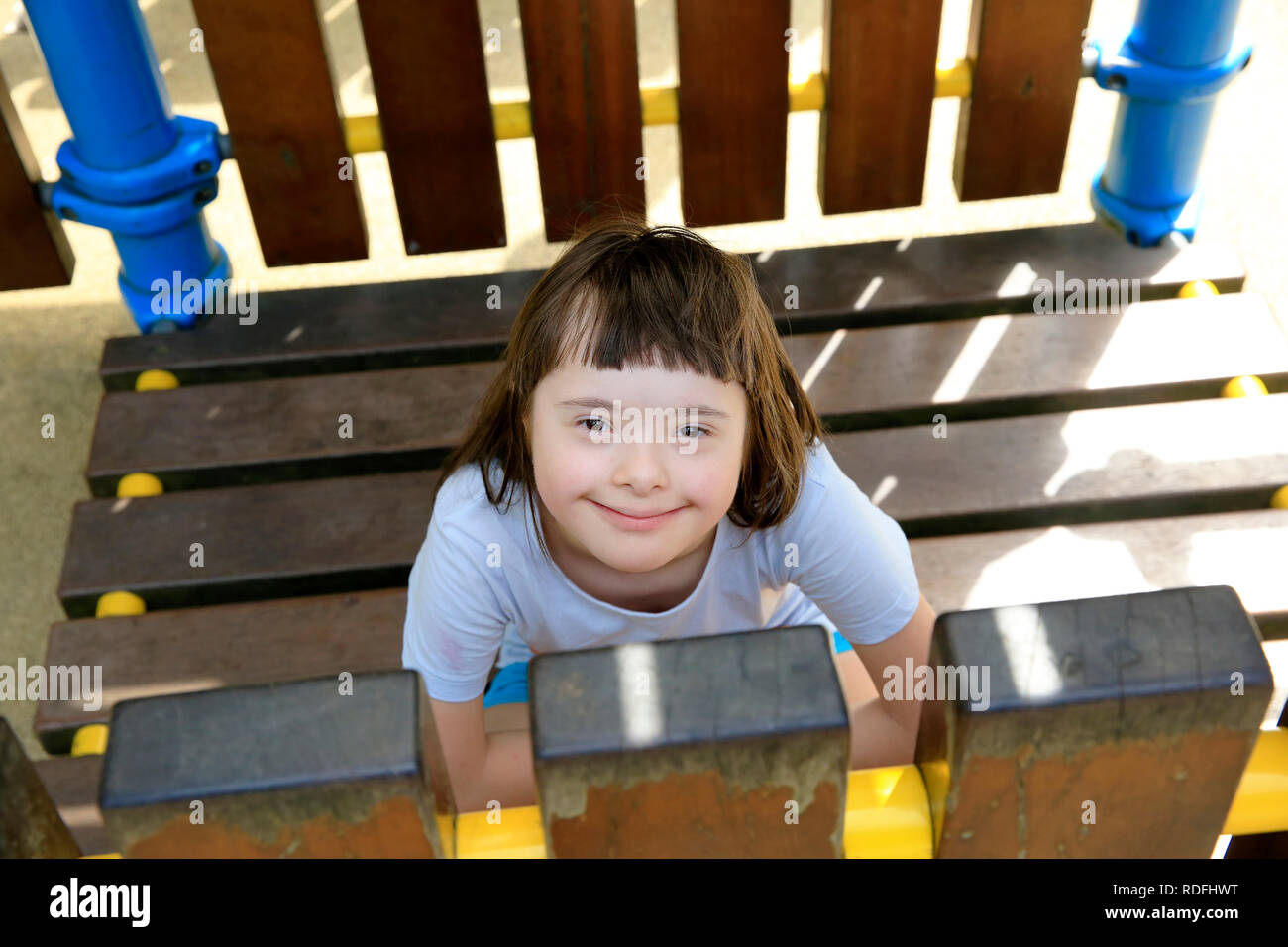 Portrait of little girl smiling in the park Stock Photo - Alamy