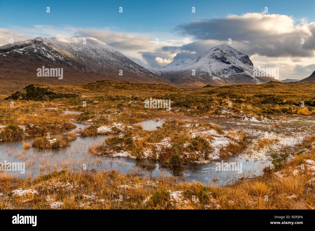 Moor landscape with snow-covered peaks of the Cullins Mountains in Highland Landscape, Sligachan, Portree, Isle of Sky, Scotland Stock Photo
