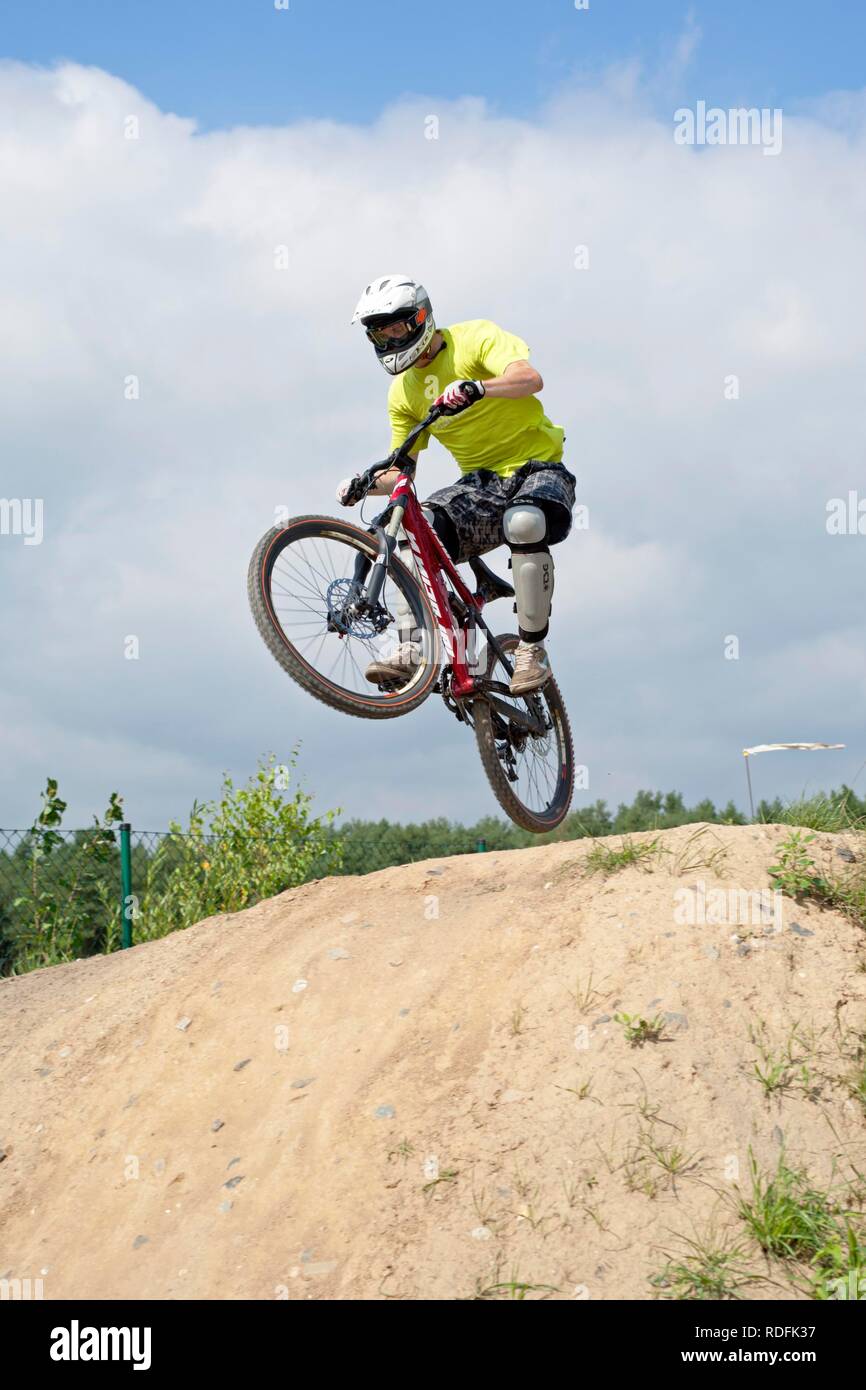 Biker jumping with his bike Stock Photo Alamy