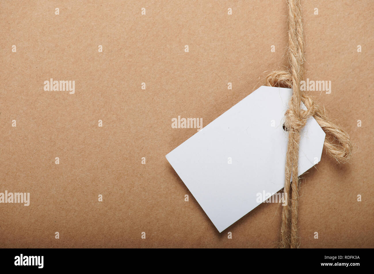 Brown Paper Tag With String Isolated On White Background With Clipping  Paths Stock Photo, Picture and Royalty Free Image. Image 36966367.