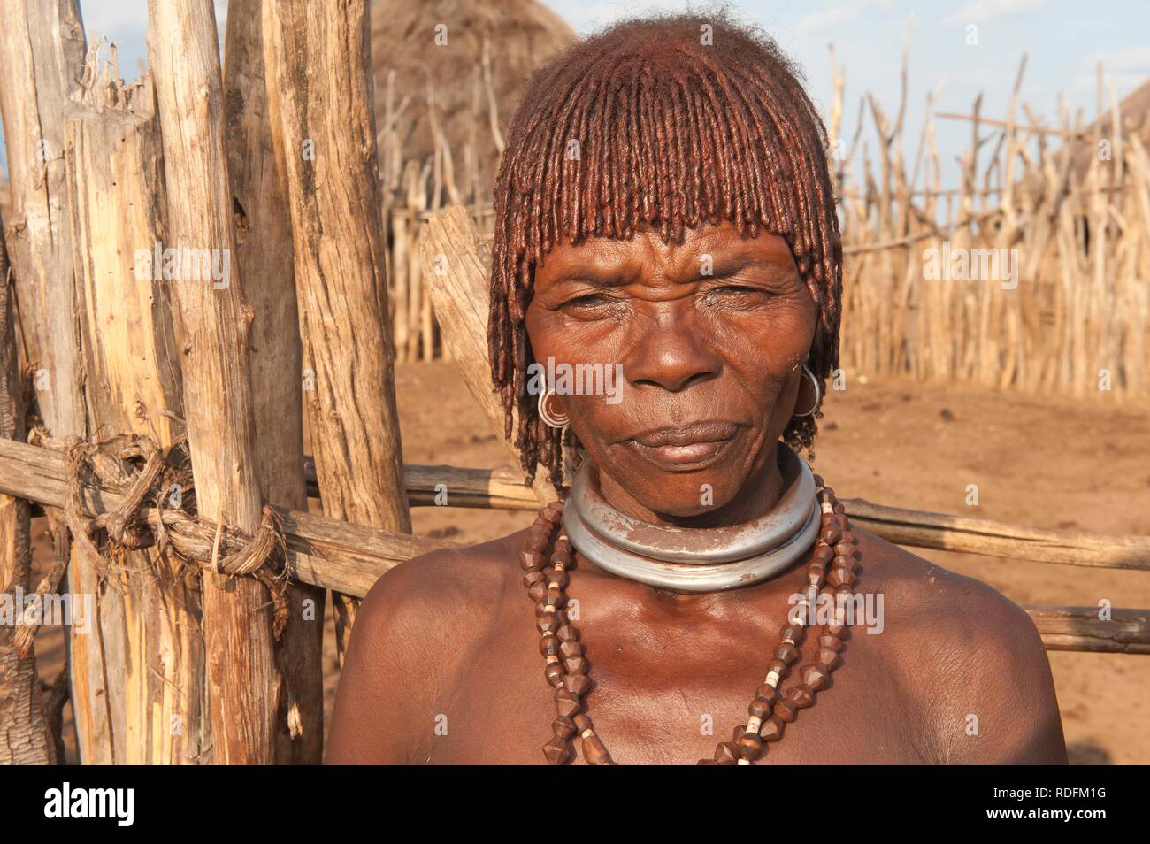 Elderly Hamar woman with traditional hairstyle with red clay in her hair and with necklaces, Omo river valley, Southern Ethiopia Stock Photo - Alamy Elderly Hamar woman with traditional hairstyle with red clay in her hair and with necklaces, Omo river valley, Southern Ethiopia Stock Photo - Alamy