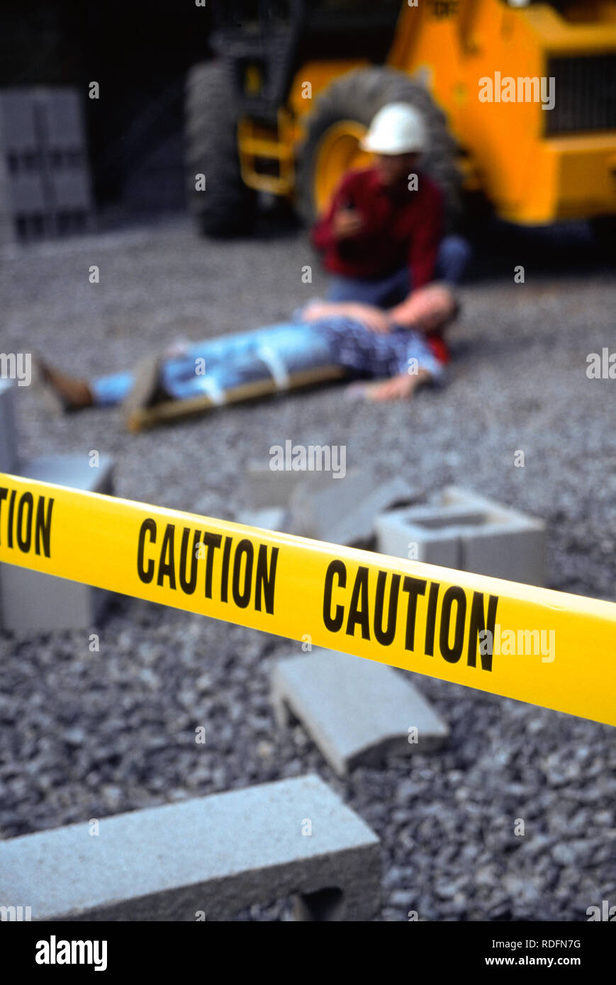 Industrial Accident and First Aid with Injured Tradesman, USA Stock