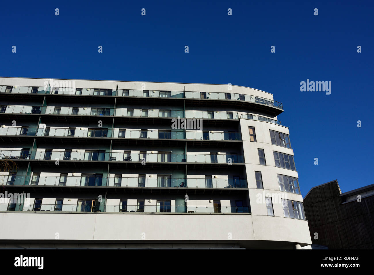 Residential properties, apartments with balconies, part of the rock