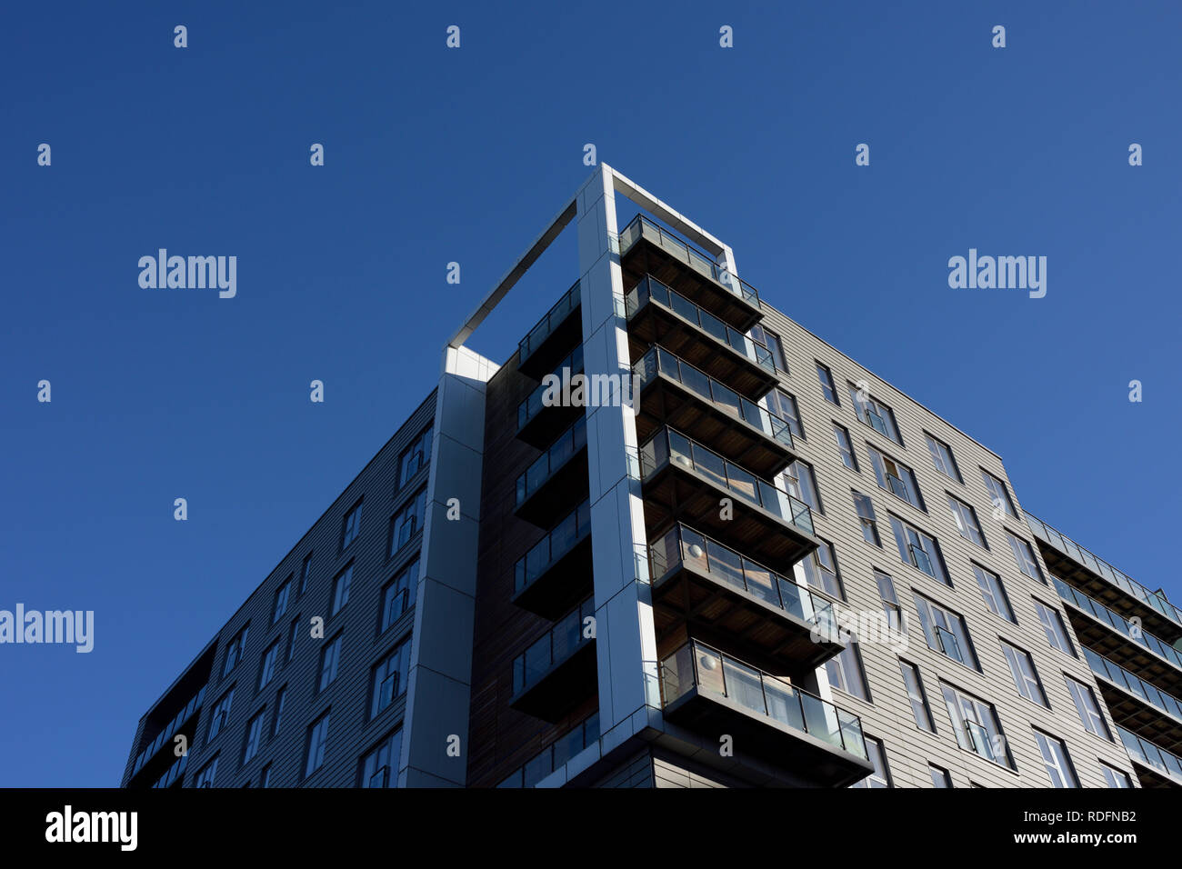 Residential properties, apartments with balconies, part of the rock