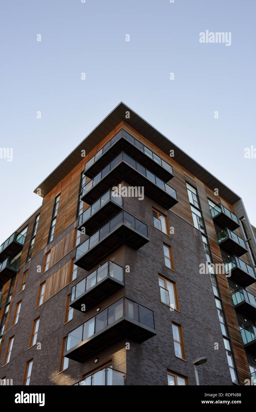 Residential properties, apartments with balconies, part of the rock