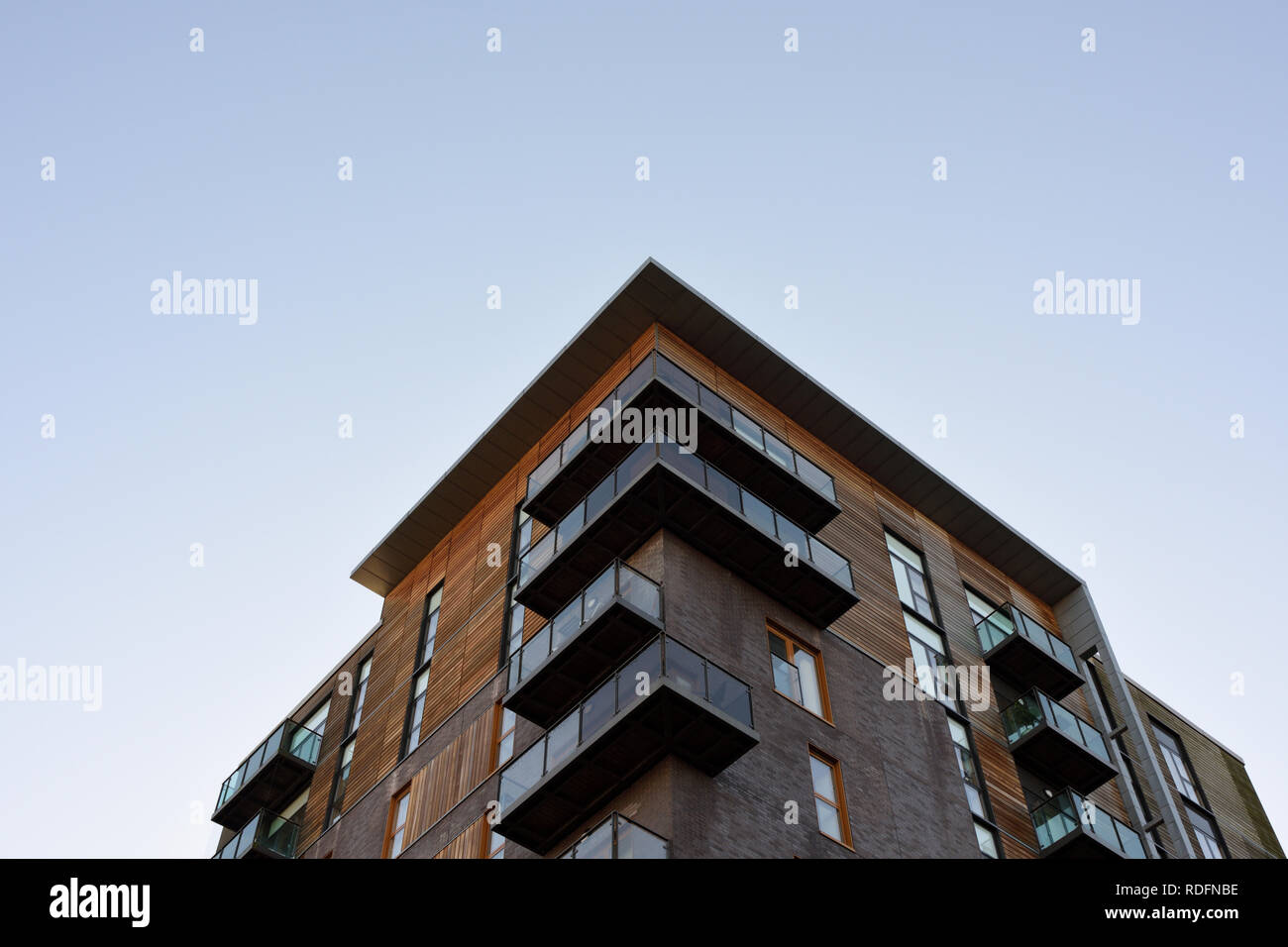 Residential properties, apartments with balconies, part of the rock