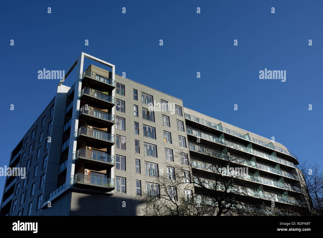 Residential properties, apartments with balconies, part of the rock