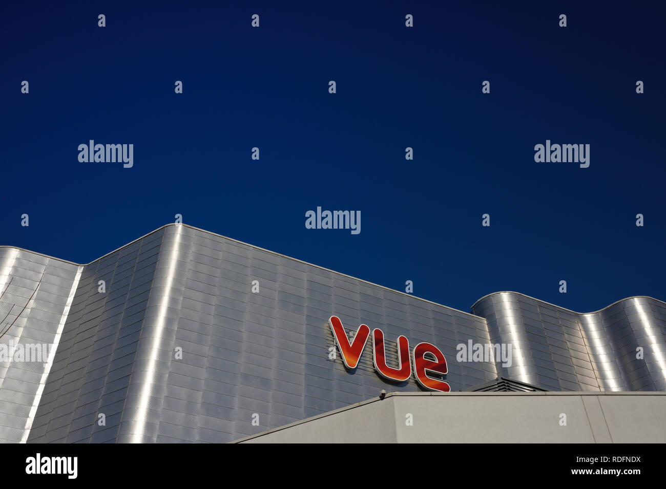 Modern building exterior with aluminium rainscreen cladding, sunlight ...