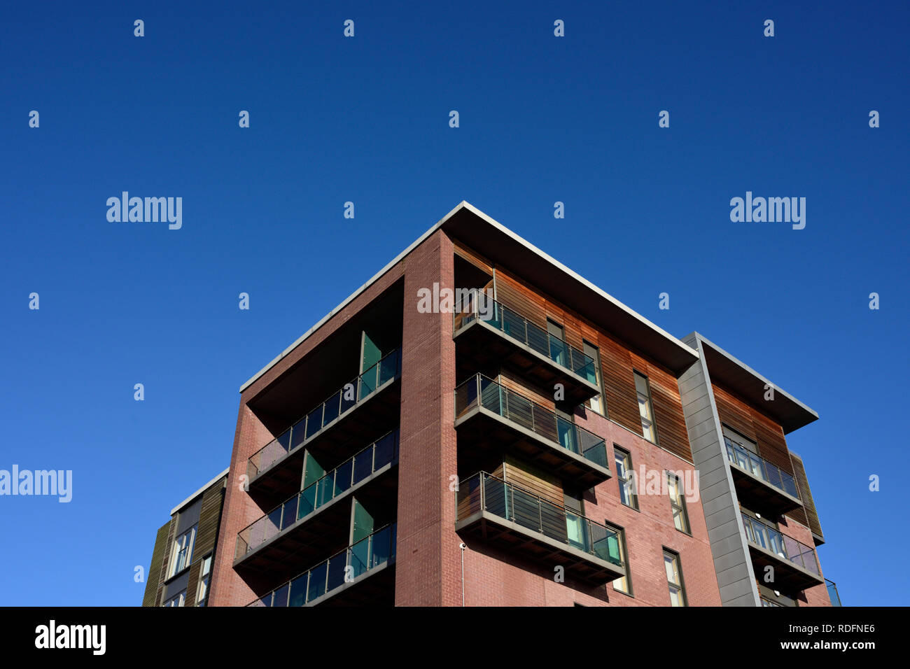 Residential properties, apartments with balconies, part of the rock