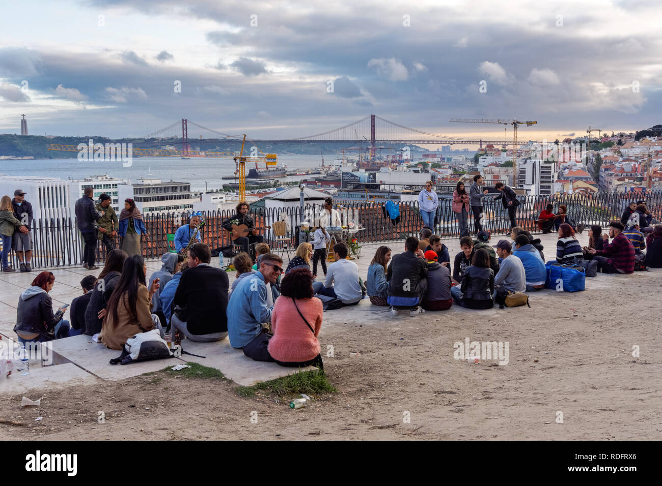 Young People Enjoying Sunset At Miradouro De Santa Catarina In Lisbon Portugal Stock Photo Alamy