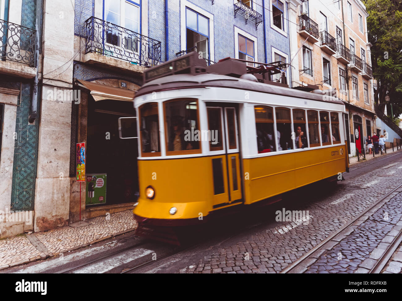 Classic tram route 28 in the Alfama district in Lisbon, Portugal Stock Photo Alamy