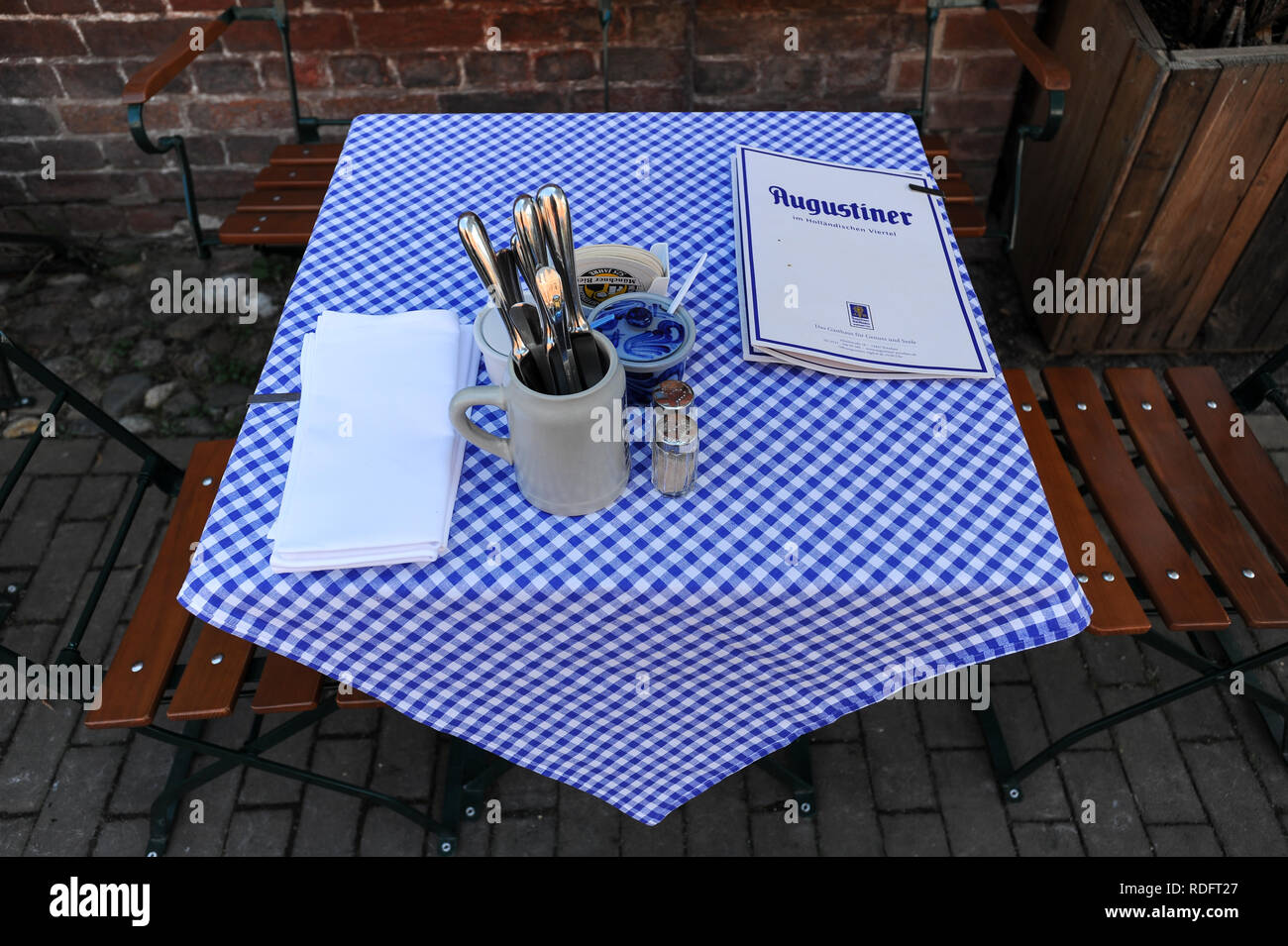 18.09.2014, Potsdam, Brandenburg, Germany, Europe - An empty table at a restaurant in the Dutch Quarter. Stock Photo