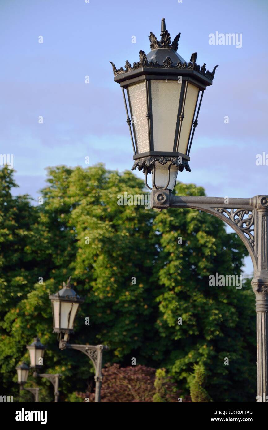 street lamps in a park Stock Photo - Alamy