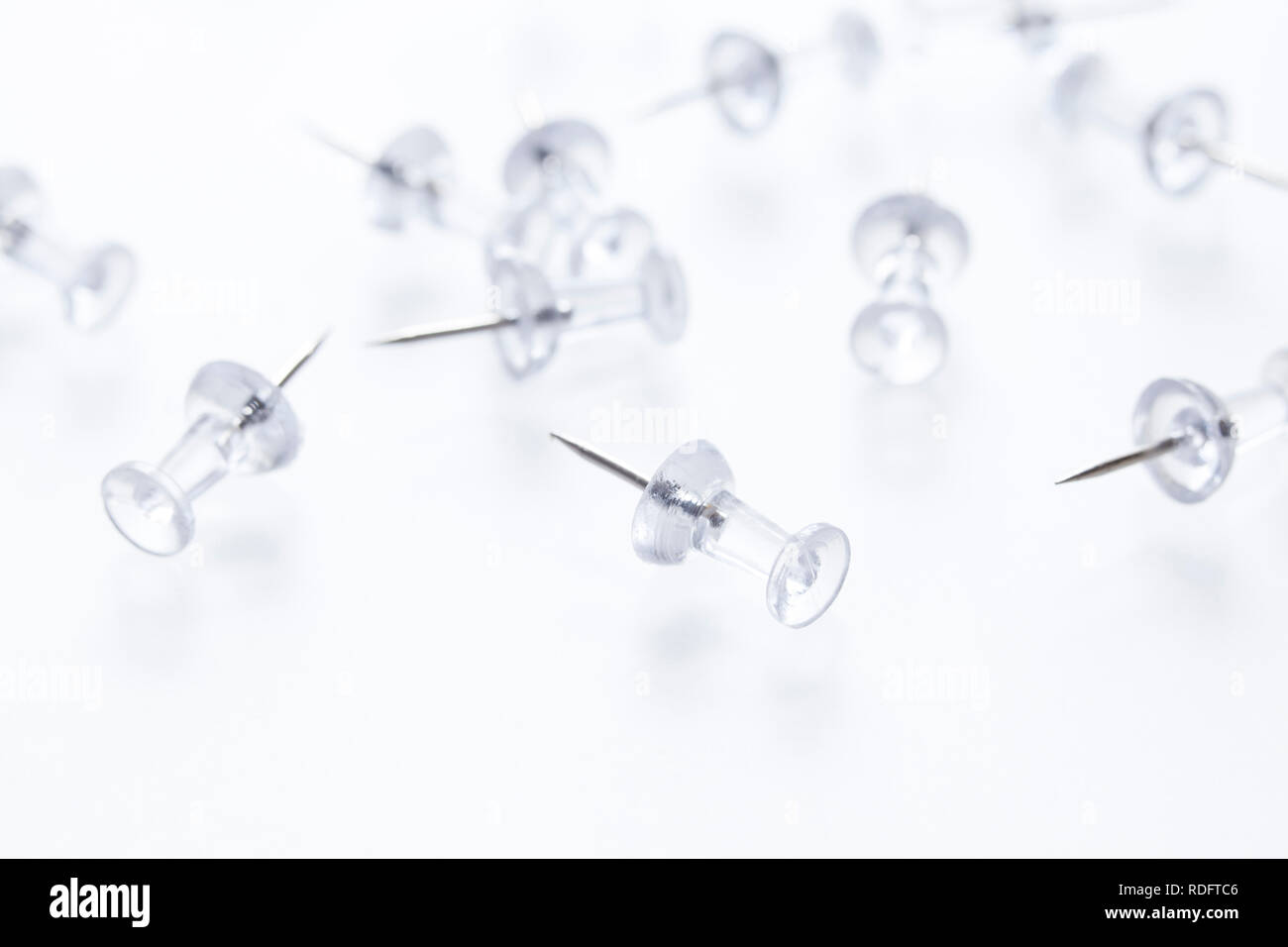 Push pins on white ( aka map pins ) Stock Photo