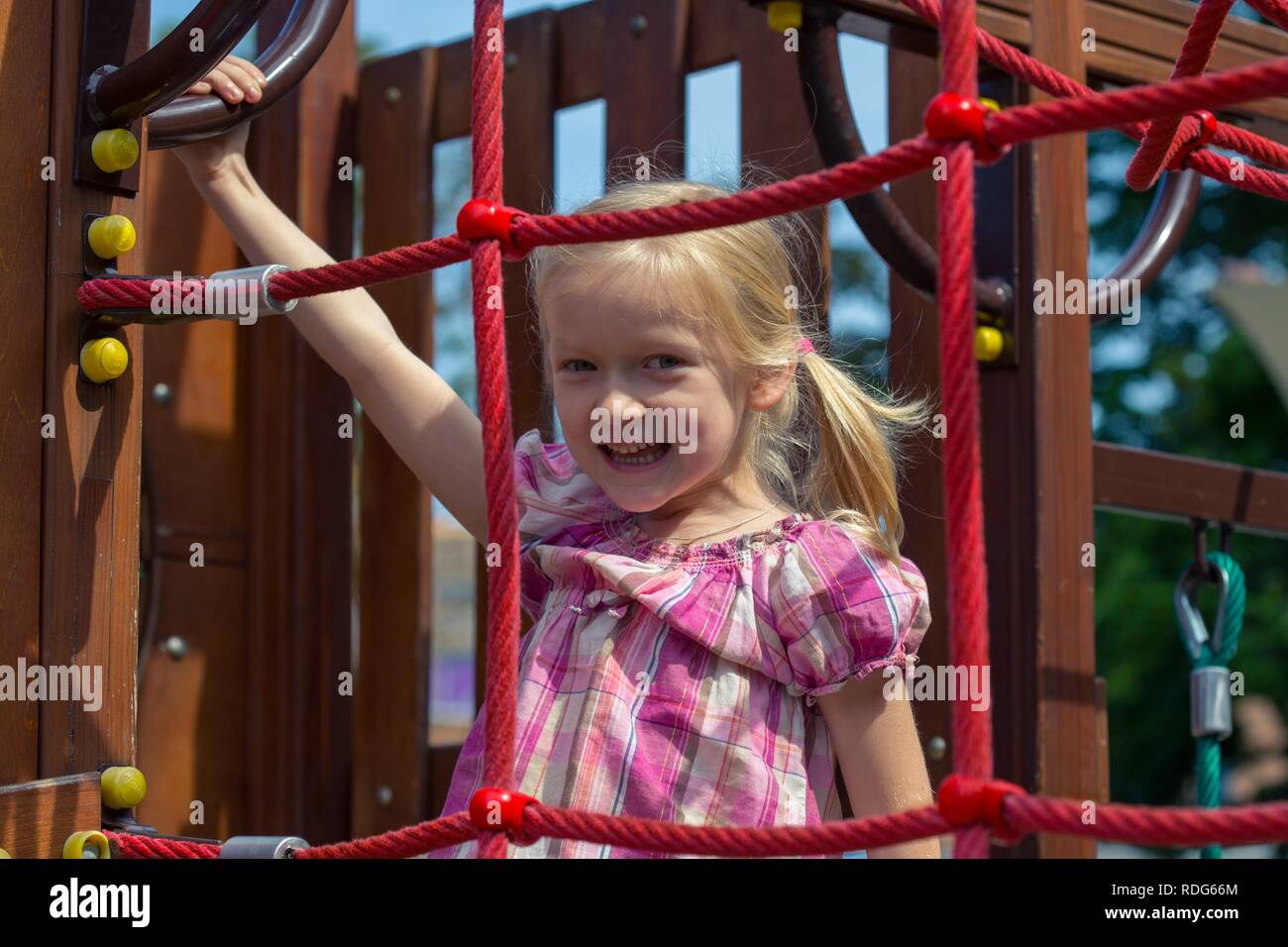 smiling little girl at the playground Stock Photo - Alamy