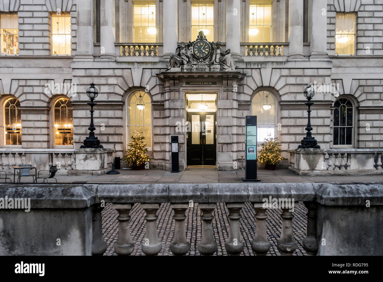 Exterior and one entrance of the neoclassical Somerset House in central London, England, with illumnated Christmas Trees. Stock Photo
