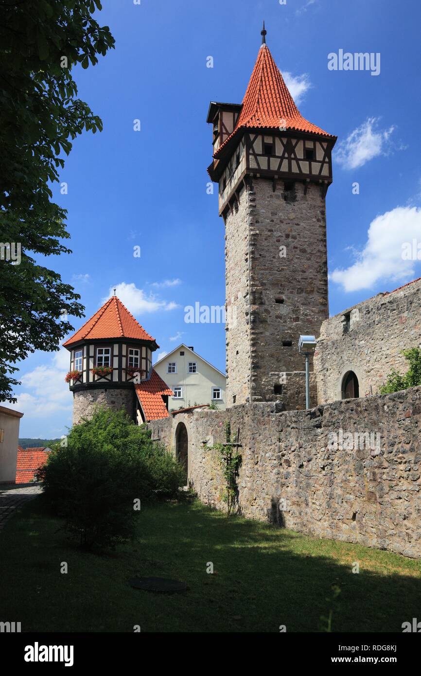 Zwingerturm and Waagglockenturm towers of the Kirchenburg Ostheim fortified church, Ostheim vor der Rhoen Stock Photo