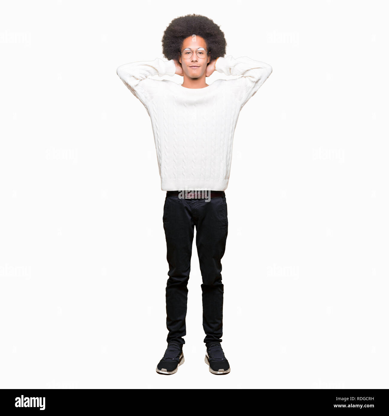 Young African American Man With Afro Hair Wearing Glasses Relaxing